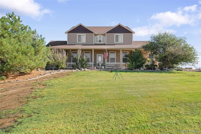 32401 E 147th Ave, Brighton, CO 80603 - view of front of property featuring a front lawn and covered porch