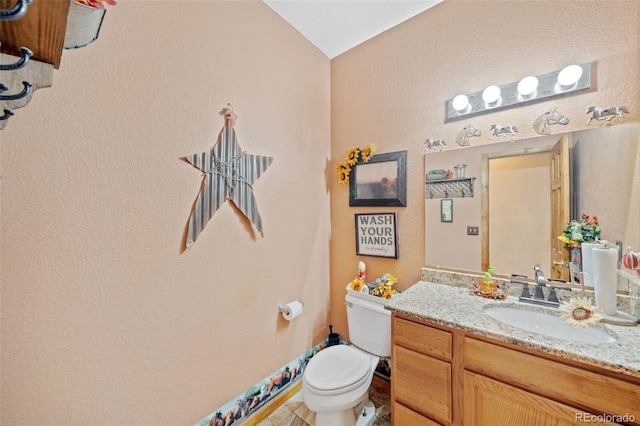32401 E 147th Ave, Brighton, CO 80603 - bathroom featuring vanity and a textured wall