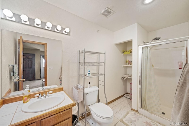 32401 E 147th Ave, Brighton, CO 80603 - bathroom with a shower stall, vanity, and tile patterned flooring