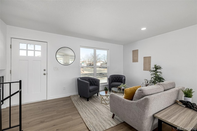 4752 E 108th Pl, Thornton, CO 80233 - living room featuring wood finished floors, baseboards, and recessed lighting