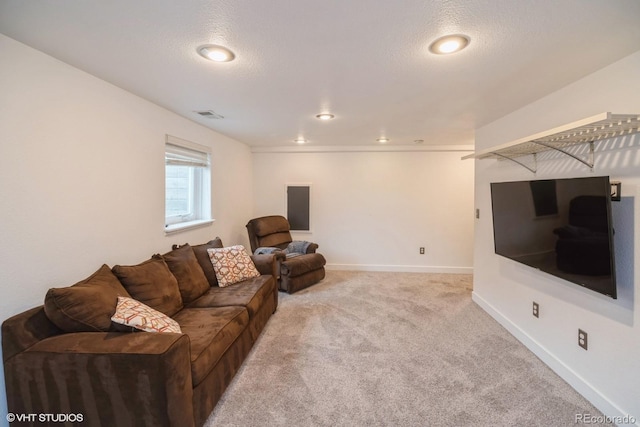 living room with carpet flooring, a textured ceiling, recessed lighting, baseboards, and visible vents