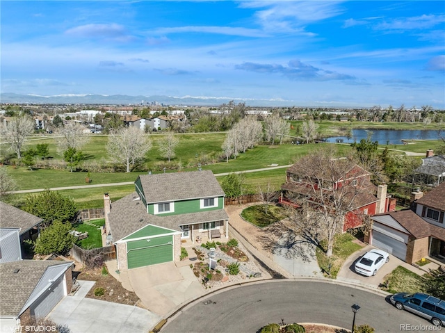 bird's eye view with a water view and a residential view