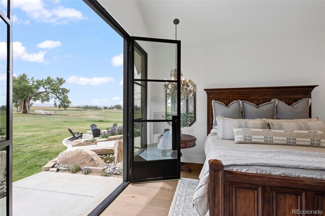 bedroom featuring light hardwood / wood-style floors