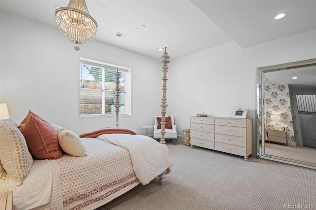 bedroom with carpet and a chandelier