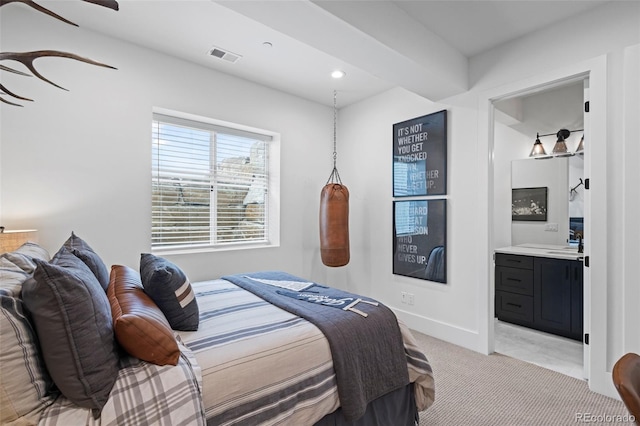 carpeted bedroom with sink