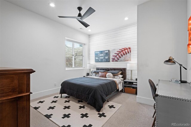 carpeted bedroom with ceiling fan