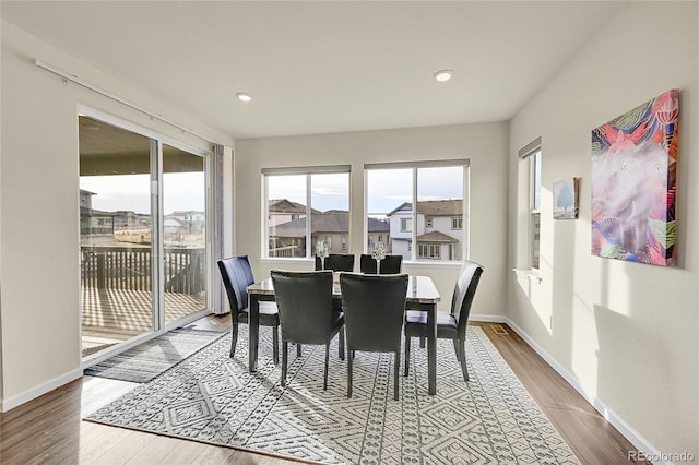 dining room featuring hardwood / wood-style flooring