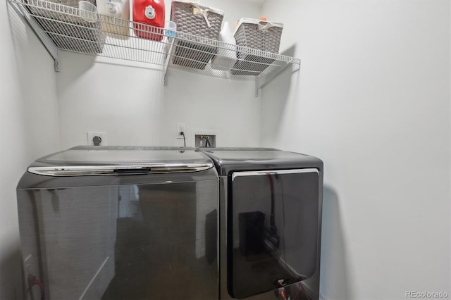 laundry area featuring laundry area and separate washer and dryer