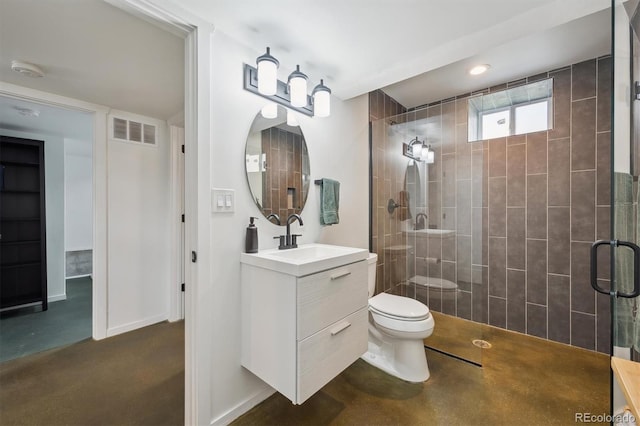 bathroom with visible vents, a stall shower, vanity, baseboards, and toilet