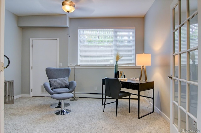 home office featuring a baseboard radiator, baseboards, carpet, and visible vents