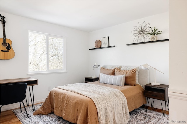 bedroom featuring hardwood / wood-style floors