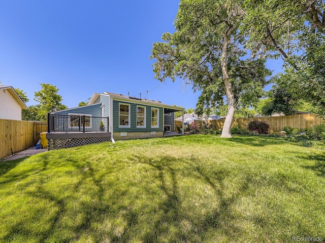 9540 King Way, Westminster, CO 80031 - rear view of property with a fenced backyard and a deck