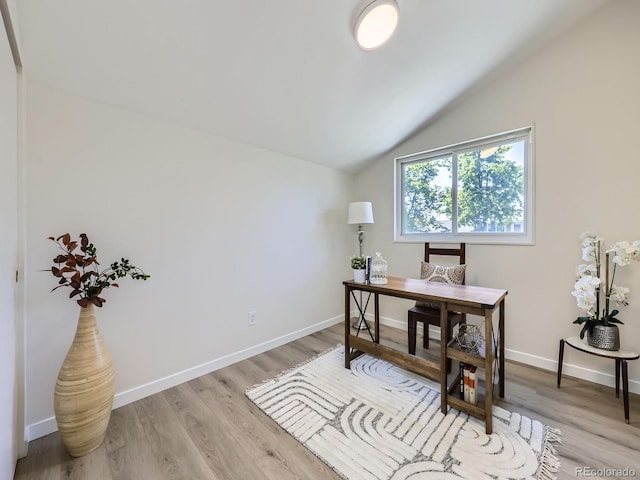 9540 King Way, Westminster, CO 80031 - home office featuring vaulted ceiling and light wood-style floors