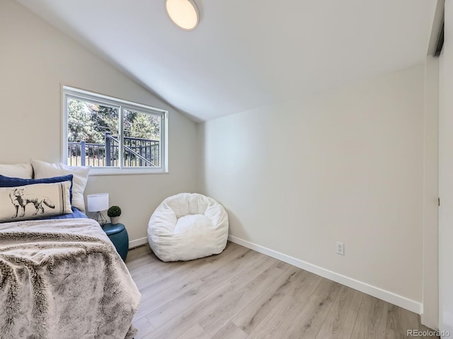 9540 King Way, Westminster, CO 80031 - bedroom with lofted ceiling and light wood-type flooring