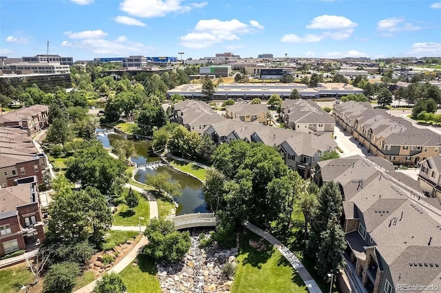 drone / aerial view with a water view