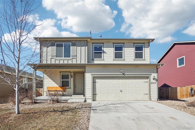 view of front of house with driveway, a garage, fence, a porch, and board and batten siding