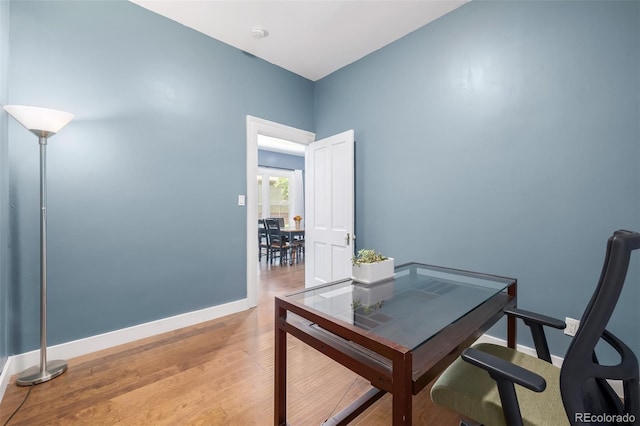 home office featuring hardwood / wood-style flooring