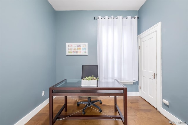 office featuring hardwood / wood-style floors