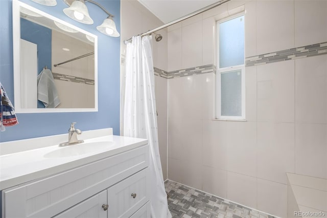 bathroom with vanity and walk in shower