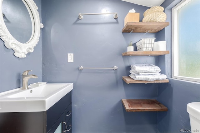 bathroom featuring sink and toilet