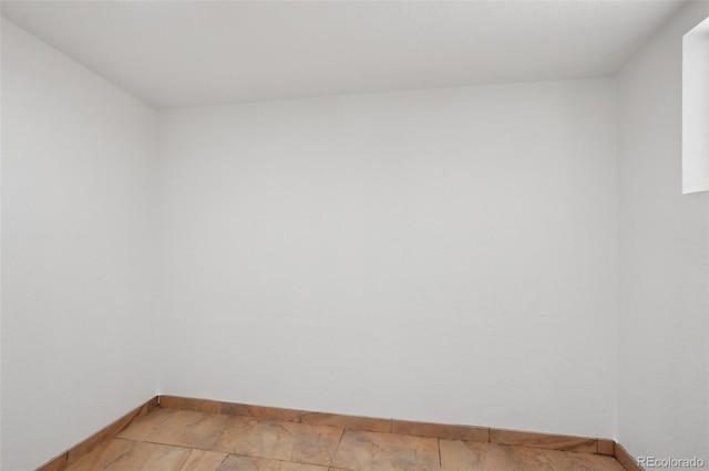 7180 Zuni St, Denver, CO 80221 - spare room with baseboards