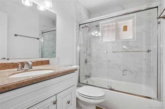 7180 Zuni St, Denver, CO 80221 - bathroom featuring enclosed tub / shower combo, toilet, and vanity