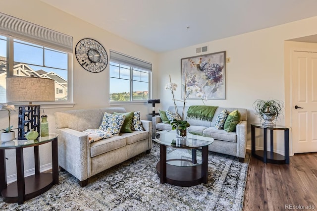 5757 S Algonquian Way Unit E, Aurora, CO 80016 - living room with wood finished floors and baseboards