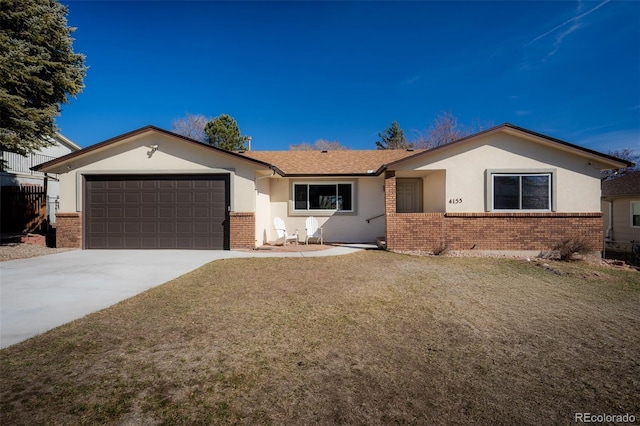 single story home with a garage, concrete driveway, and brick siding