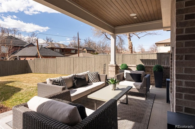 view of patio with a fenced backyard and an outdoor hangout area