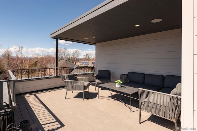 deck featuring outdoor lounge area
