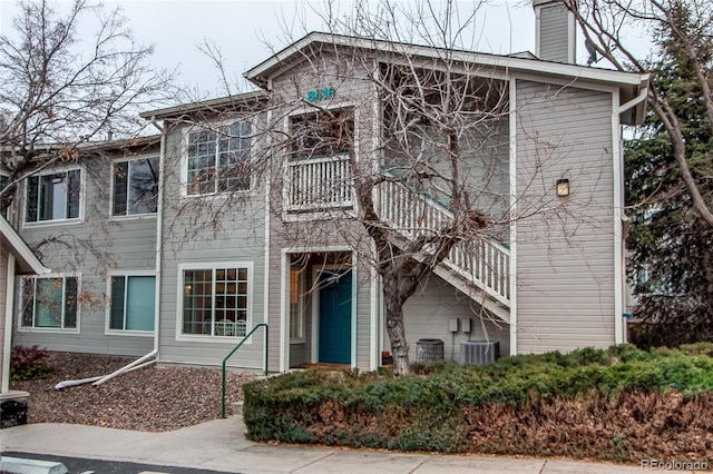 view of front of home featuring central air condition unit