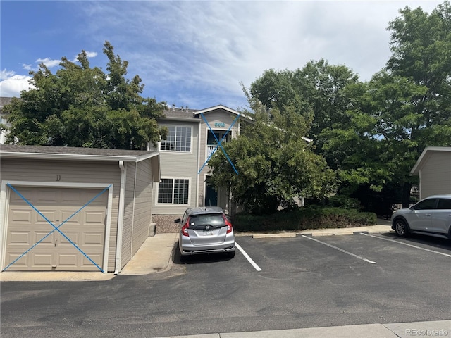 8416 Pebble Creek Way Unit 203, Highlands Ranch, CO 80126 - view of front of house with uncovered parking