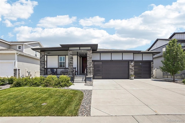 5680 Saddle Skirt St, Parker, CO 80134 - view of front of home with concrete driveway, a garage, a porch, a front yard, and stone siding