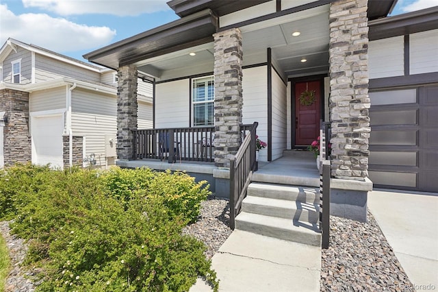 5680 Saddle Skirt St, Parker, CO 80134 - entrance to property featuring covered porch, an attached garage, and stone siding