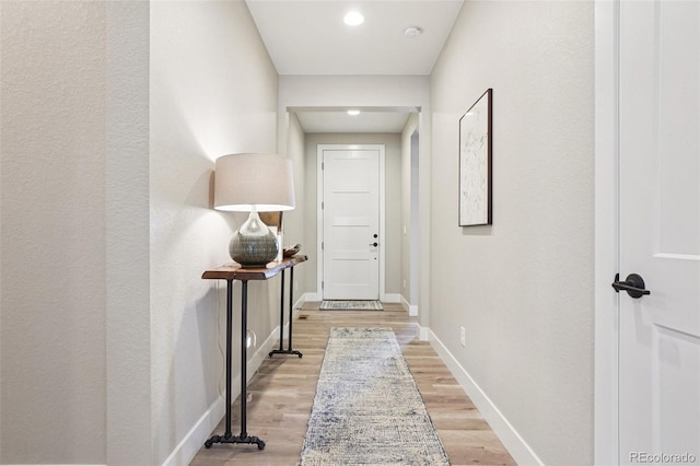 5680 Saddle Skirt St, Parker, CO 80134 - doorway featuring light wood-type flooring and recessed lighting
