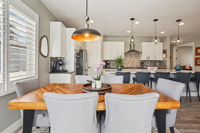 5680 Saddle Skirt St, Parker, CO 80134 - dining space with dark wood-style floors and recessed lighting