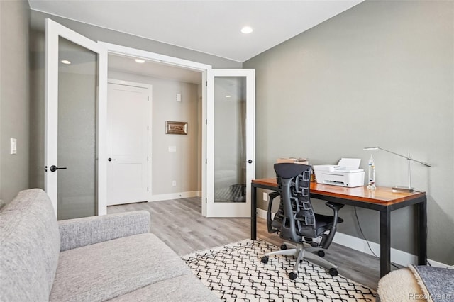 5680 Saddle Skirt St, Parker, CO 80134 - office space featuring french doors, light wood-style floors, and recessed lighting