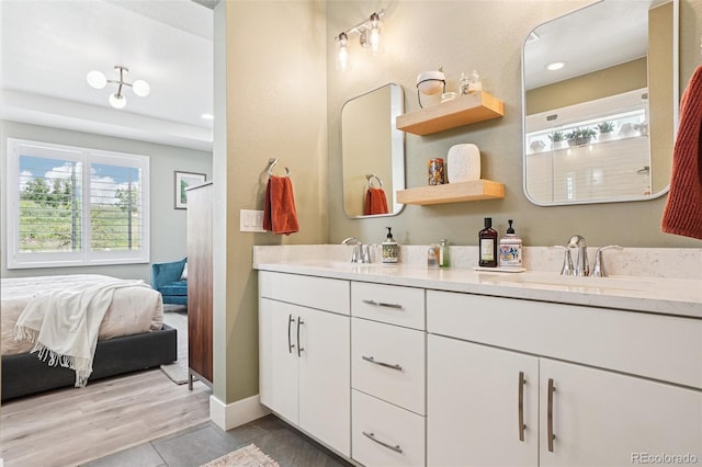 5680 Saddle Skirt St, Parker, CO 80134 - full bath with double vanity, ensuite bath, tile patterned floors, and recessed lighting