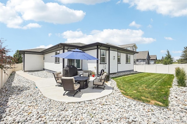 5680 Saddle Skirt St, Parker, CO 80134 - rear view of house with a fenced backyard and a patio