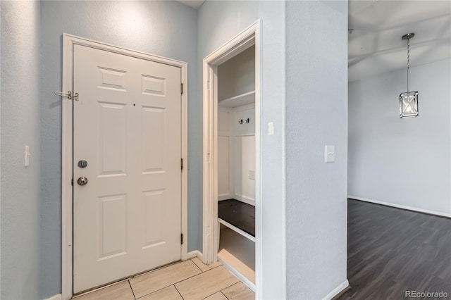 14251 E 1st Dr Unit 305, Aurora, CO 80011 - entrance foyer with light wood-style flooring and baseboards