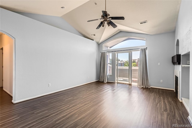 14251 E 1st Dr Unit 305, Aurora, CO 80011 - unfurnished living room featuring arched walkways, a ceiling fan, dark wood-style flooring, vaulted ceiling, and a fireplace