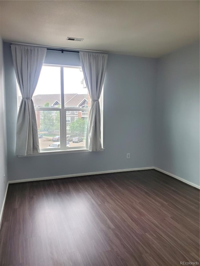 14251 E 1st Dr Unit 305, Aurora, CO 80011 - unfurnished room with dark wood finished floors