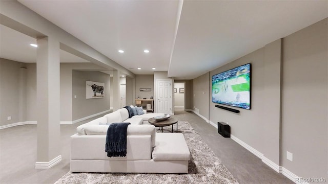 living room featuring light carpet