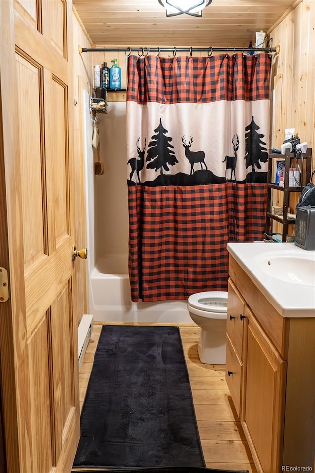 bathroom featuring toilet, shower / tub combo, wooden ceiling, and vanity