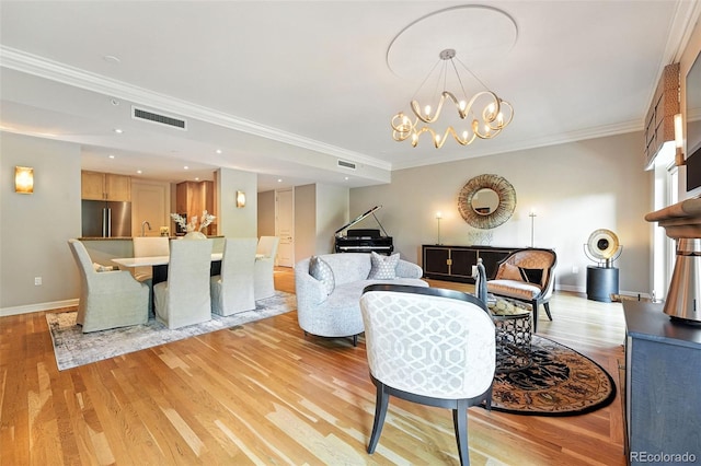 2400 E Cherry Creek S Drive 307, Denver, CO 80209 - living room featuring light wood-style floors, ornamental molding, and a chandelier