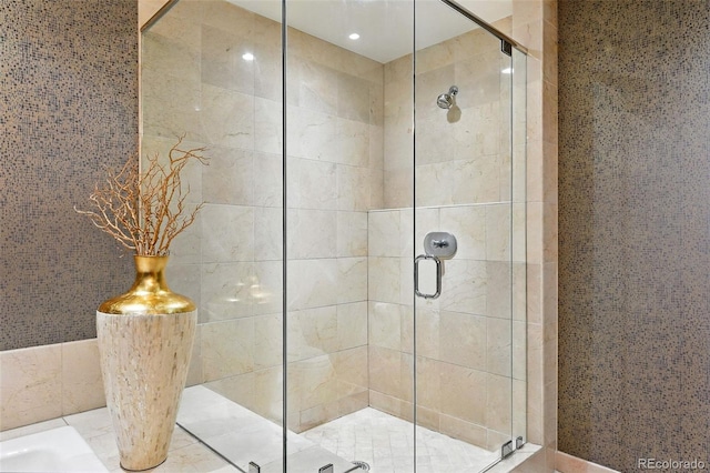 2400 E Cherry Creek S Drive 307, Denver, CO 80209 - bathroom featuring a shower stall and a tub