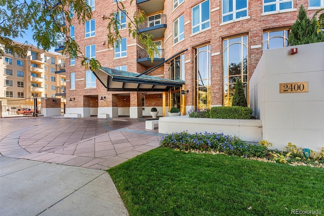 2400 E Cherry Creek S Drive 307, Denver, CO 80209 - view of exterior entry featuring brick siding