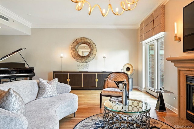 2400 E Cherry Creek S Drive 307, Denver, CO 80209 - living room featuring a chandelier, wood finished floors, a fireplace with flush hearth, and ornamental molding