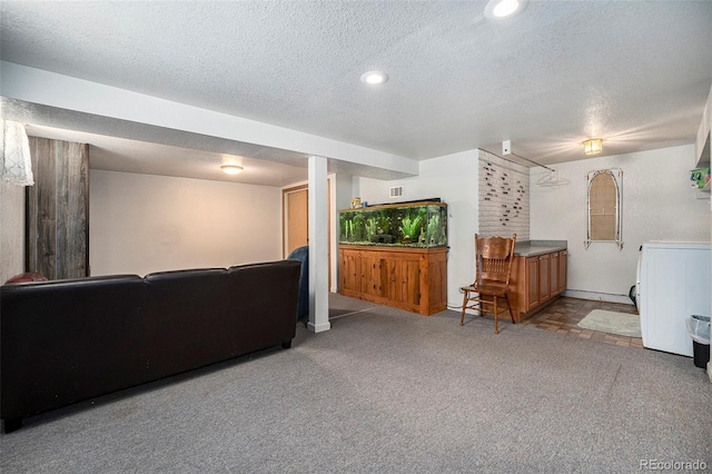 carpeted living room with washer / clothes dryer, a textured ceiling, recessed lighting, and baseboards