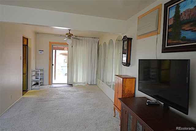11823 Williams Way, Northglenn, CO 80233 - unfurnished living room with carpet flooring, ceiling fan, and baseboards